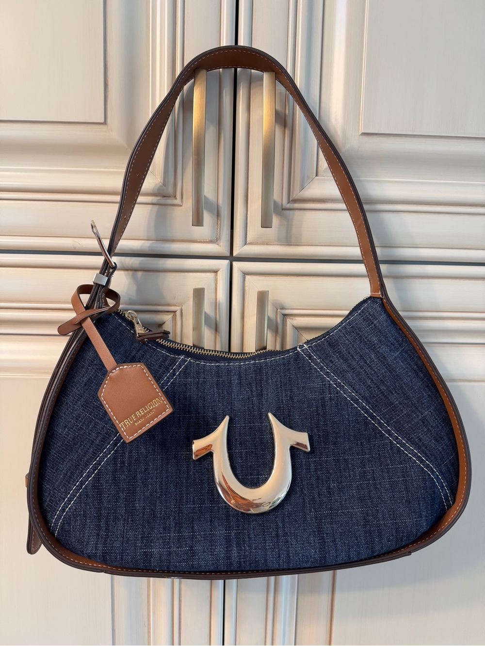 True Religion Dark Blue Denim Hobo with Brown Trim and Gold Logo